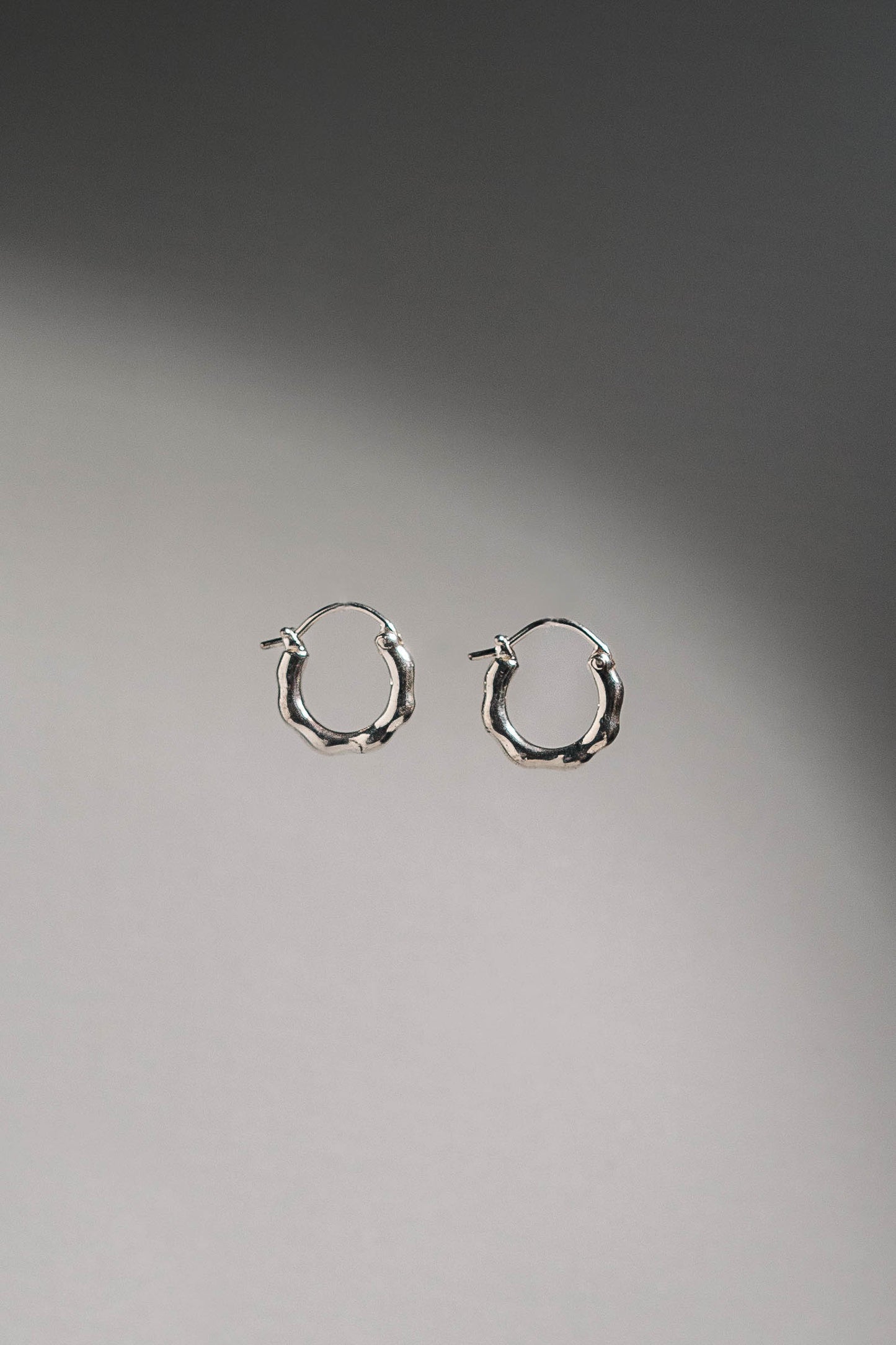 Product Shot of 925 Sterling Silver chunky hoop earrings.